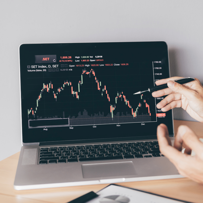 Trader analyzing complex technical indicators for strategic insights.